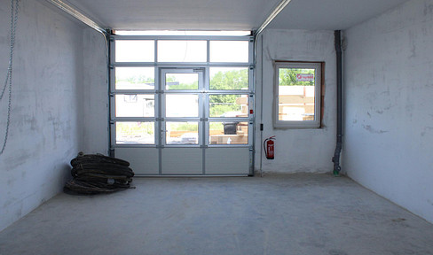 Commercial hall Warehouse hall Storage area Storage room with roller shutter door