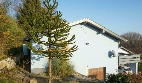 Einfamilienhaus mit Wintergarten auf schönem Grundstück