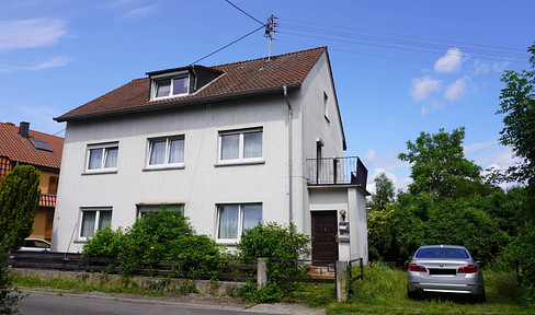 Well-maintained two-family house plus additional building or garden plot in mixed development area