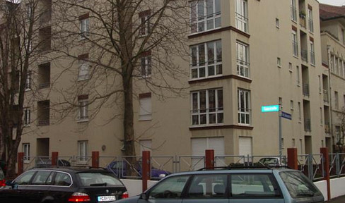 Exclusive, renovated 1-room first floor apartment with balcony and new fitted kitchen in Halle
