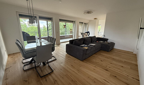 Moderne 3-Zimmer-Wohnung mit Garten und Balkon