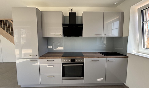Erstbezug mit EBK: Stilvolle 3-Zimmer-Erdgeschosswohnung mit geh. Innenausstattung
