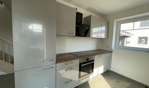 Erstbezug mit EBK: Stilvolle 3-Zimmer-Erdgeschosswohnung mit geh. Innenausstattung