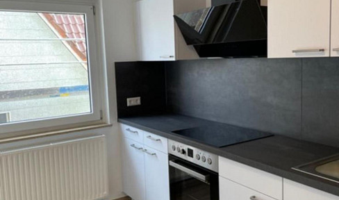 Well-kept attic apartment with three rooms, balcony and fitted kitchen in Rosenfeld