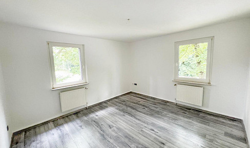 Renovated apartment with private garden and parking space in quiet cul-de-sac location