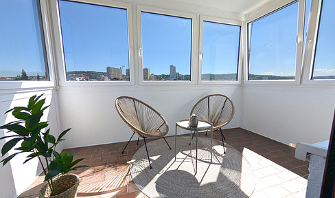 Move in immediately: cozy 2-room apartment with conservatory, parking space and fitted kitchen