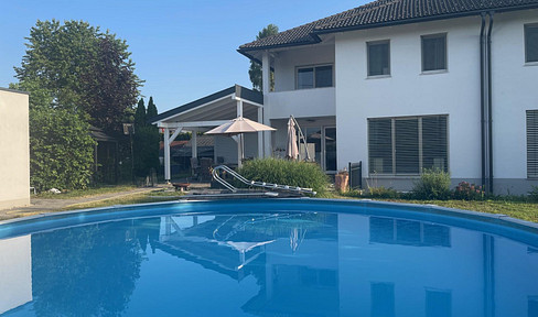Gepflegte Doppelhaushälfte Süd/West-Seite, mit Doppelgarage und sonnigem Garten in Toplage