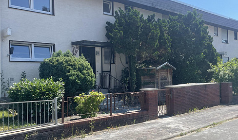 Modernized mid-terrace house with conservatory, garage & large garden - move in and feel good!