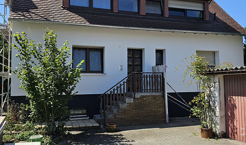 Beautiful 3-family house with further property with potential