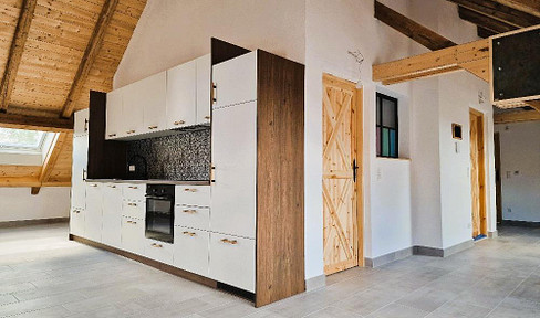 DG Wohnung | The most sustainable property in Wolfsburg, built with clay, featuring solar panels for energy independence and app-based control.