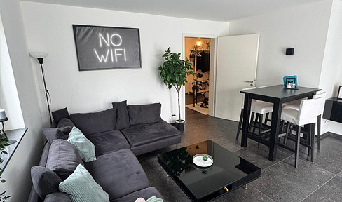 Moderne 2-Zimmer-Wohnung mit Balkon und eigenem Gartenanteil