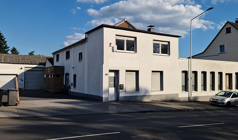 Gewerbegebäude Lager/Ausstellung/Büro/Wohnung