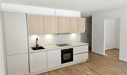 Newly built apartment with large balcony and fitted kitchen