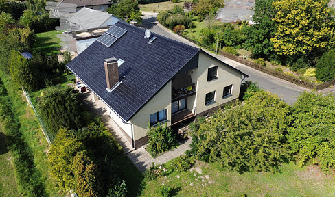 Spacious first floor apartment with garden and fireplace - 153 m² of living comfort at the highest level