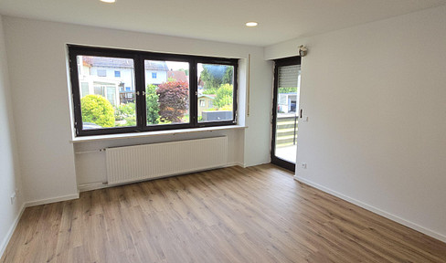Refurbished 3-room first floor apartment with private garden area