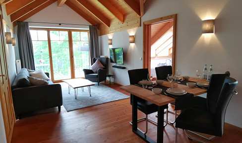 Spacious 3-room attic apartment (95 sqm) directly on the Wittensee, available immediately