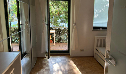 Charming two-room apartment with open fitted kitchen