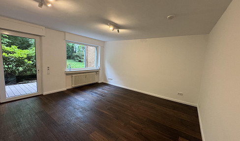 Rhine jewel with garden terrace: High-quality apartment in a unique location - ready to move into