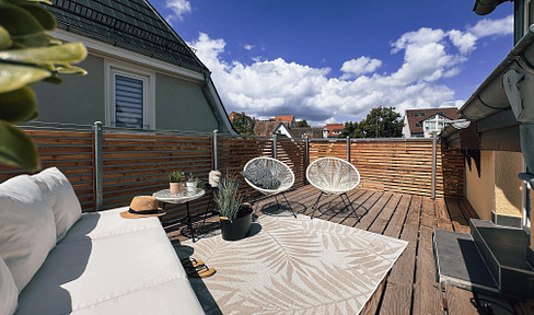 Exclusive 2-room apartment with roof terrace, fitted kitchen and parking space
