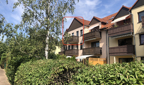 Charming 2-room maisonette in a green setting with south-facing balcony, fitted kitchen and parking space