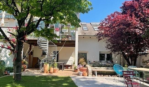 Dreamlike feel-good architecture: modern, spacious apartment with garage, terraces & family garden