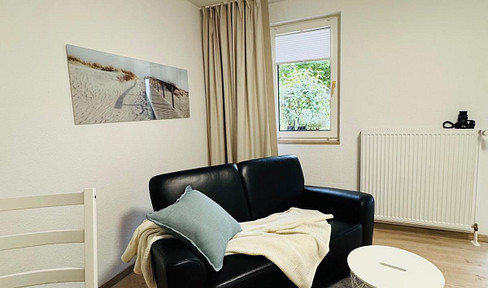 Chic single apartment with terrace and private duplex parking space