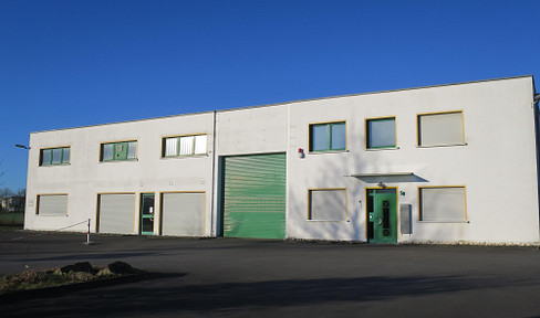 Hall with exhibition, sales, storage, office, and ancillary spaces, potentially divided into three separate areas.