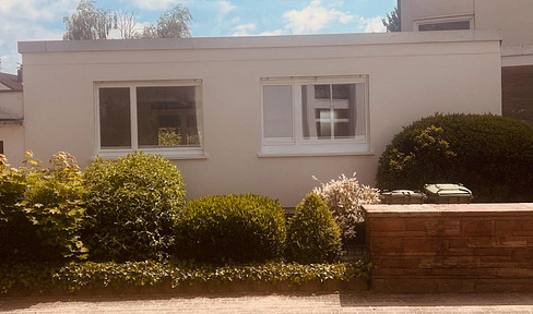 A home-like atmosphere spread over two floors - living directly on the Rhine / Investment property with a 5% return.