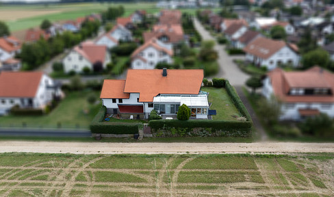 A detached or semi-detached house with a separate apartment, located in a stunning area.