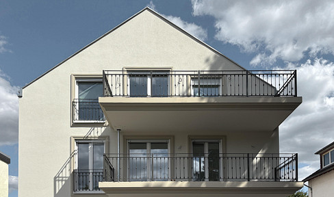 First occupancy! Modern 3-room new-build apartment with balcony and garden view on the 1st floor