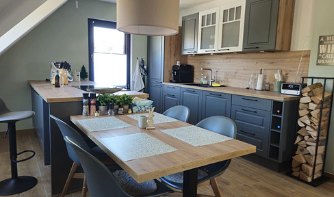Main view included: Stylishly furnished top floor apartment in an idyllic location - price VB