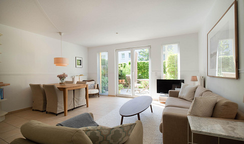 Temporary for 2 years: Partly furnished maisonette apartment with garden & underground parking space - quiet & central