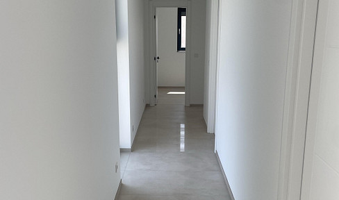 New construction, 3-room apartment, directly adjacent to farmland.