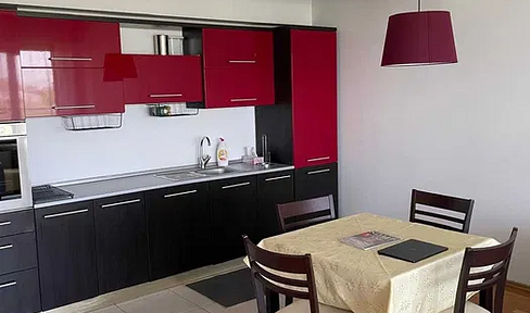 Beautiful 3-room apartment with balcony, fitted kitchen, cellar and parking space
