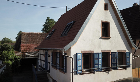 Vielseitiges Stadtdorf-Grundstück mit Projektpotenzial in ruhiger Lage von Landau-Wollmesheim