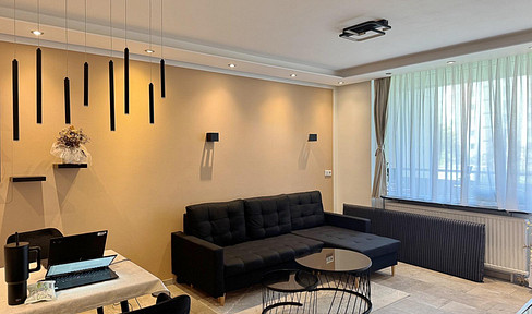 Completely renovated 2-room apartment with underground parking space in Cologne-Porz.