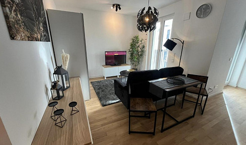 Exclusive 1-room apartment with balcony
