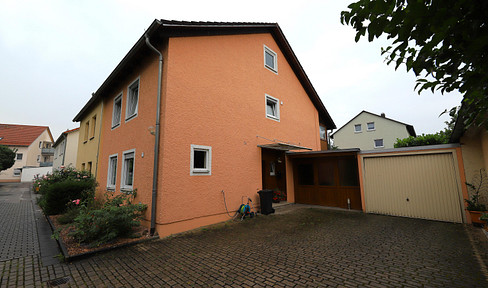 Well-kept semi-detached house with garden, garage and courtyard in Obertraubling