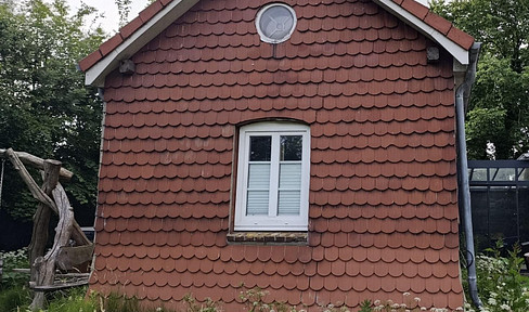 Enchanted railroad keeper's cottage with natural grounds