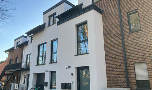 New construction townhouse with 166 m² of living space + 26 m² of attic space | Garden, terrace, and rooftop terrace | Basement, garage.