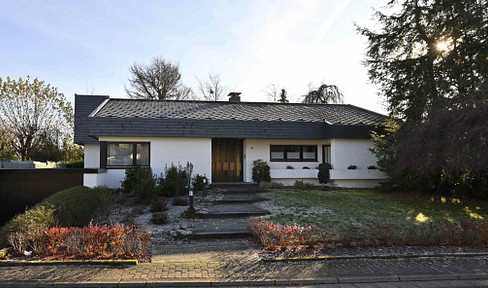 Architect-designed house in a unique location, with a large garden.