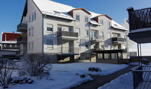 Well-kept 2-room apartment in a green setting with fitted kitchen, balcony, cellar and underground parking space