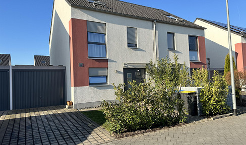 Modern semi-detached house with garage