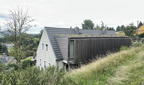 House in a quiet location, situated on a large hillside plot with expansive views.