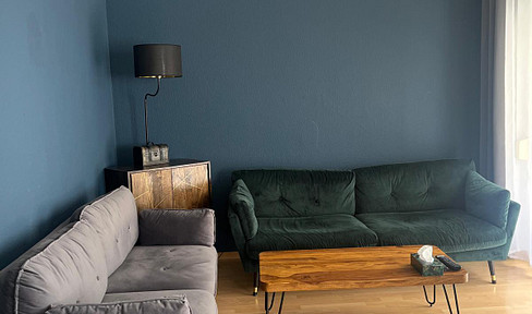 Sonnige 3 Zimmer Wohnung mit großer Terrasse und Gartenanteil
