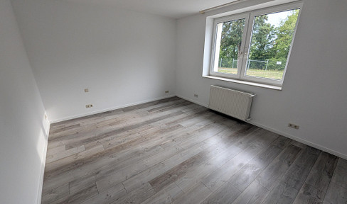 Barrier-free 3-room apartment with garden, parking space, wallbox