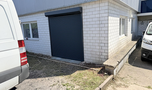 Warehouse with outdoor area, approximately 110 square meters.