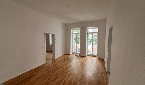 First occupancy! Central but quiet 2-room apartment with balcony and EBK