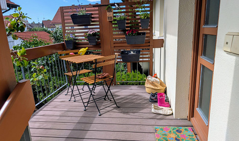 4-room maisonette apartment with covered terrace and private garden area