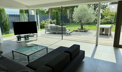 Luxury architect-designed house in prime Bonn location - loft-like bungalow directly on the Rheinaue floodplain